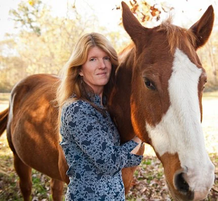 Chrissy McFarren by the horse